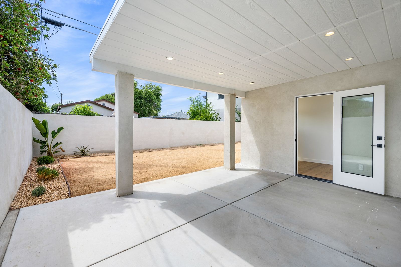 Covered patio with coated concrete in an Arizona backyard
